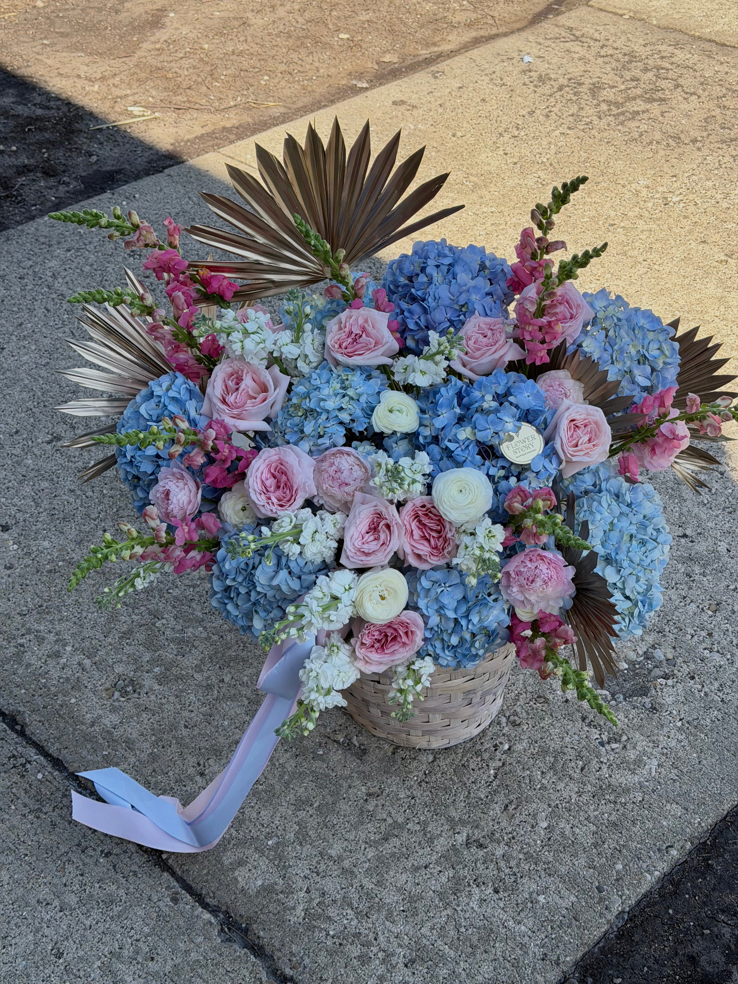 Soft mixed blooms in a basket