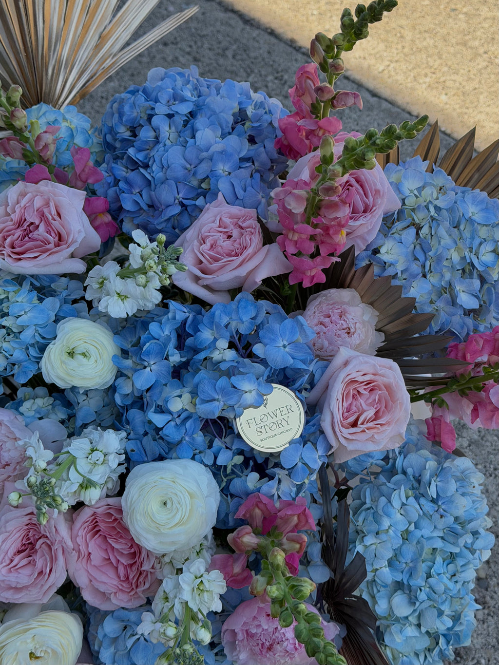Soft mixed blooms in a basket