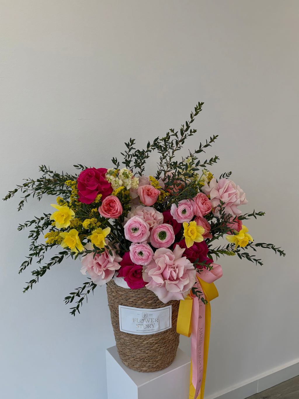 Soft mixed blooms in a basket