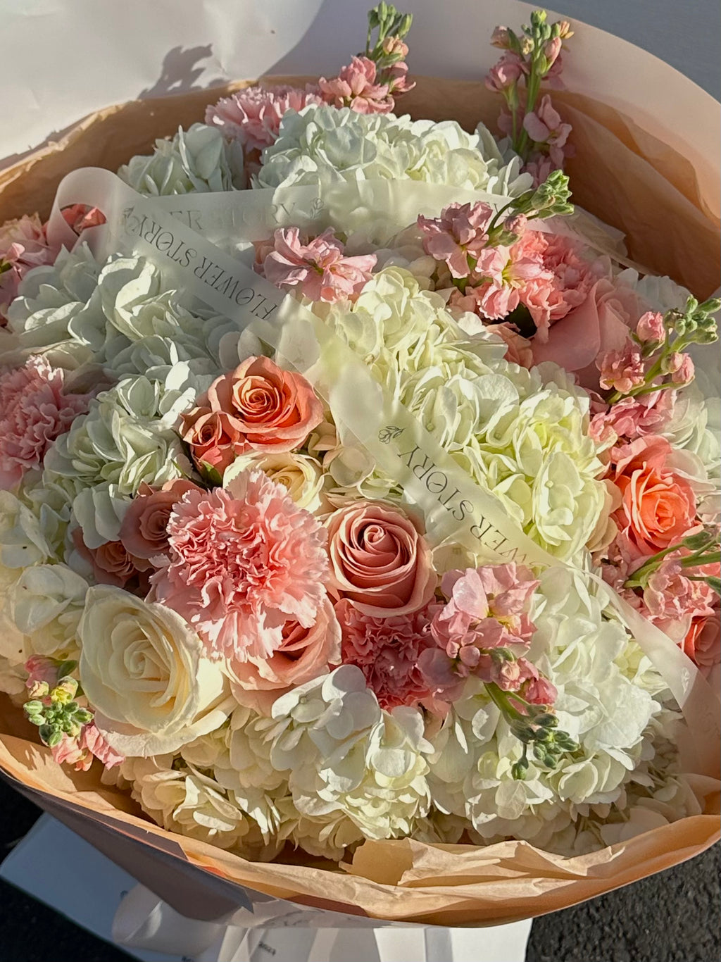 Mix bouquet with hydrangeas,stocks and roses.