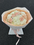 Mix bouquet with carnations and hydrangeas.