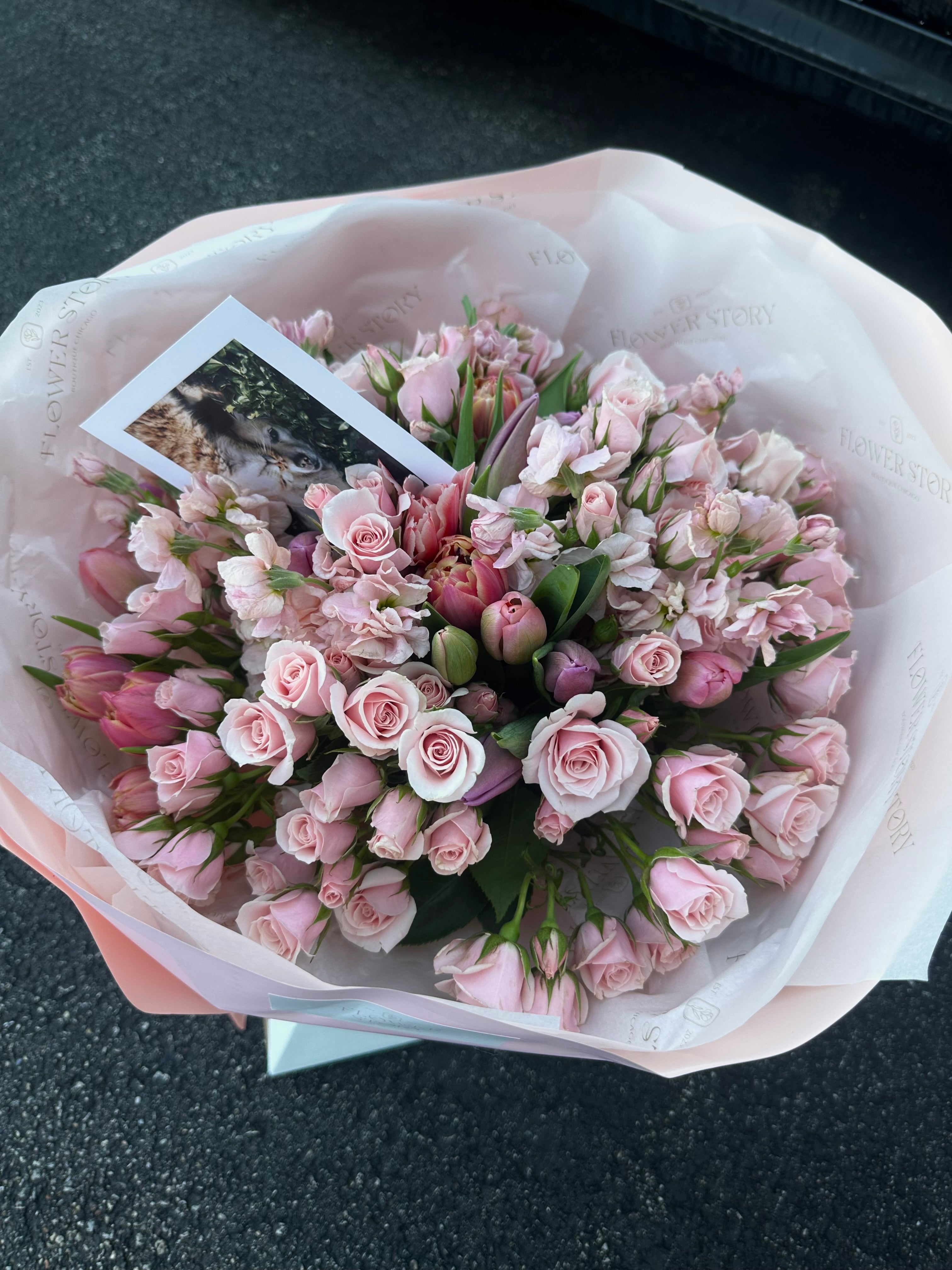 Mix bouquet of tulips and spray roses