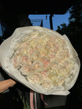 Mono bouquet of white O’Hara roses