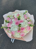 Mix bouquet with white hydrangeas and pink roses