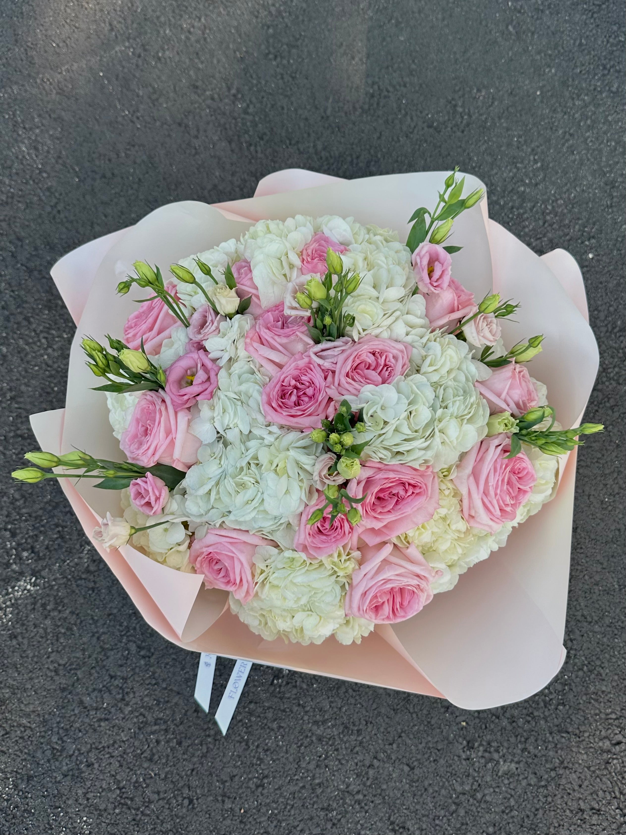 Mix bouquet with white hydrangeas and pink roses