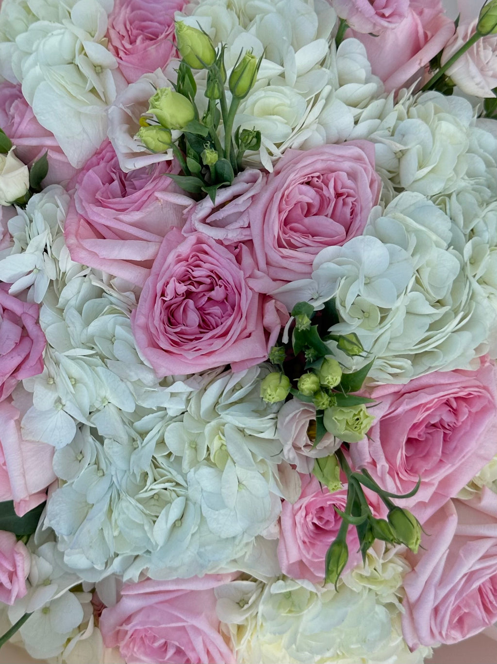 Mix bouquet with white hydrangeas and pink roses