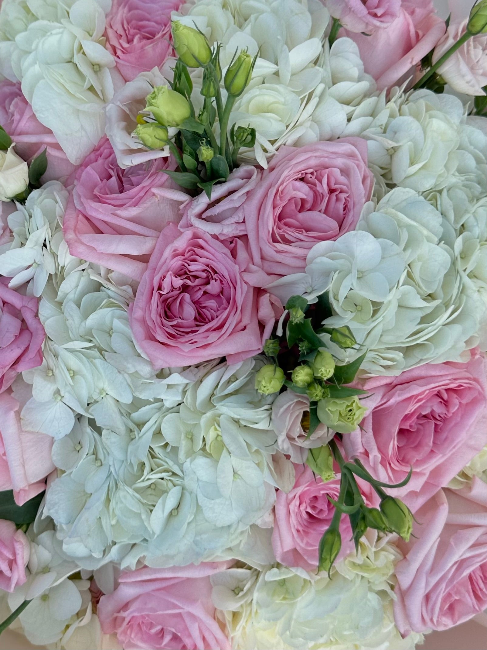 Mix bouquet with white hydrangeas and pink roses