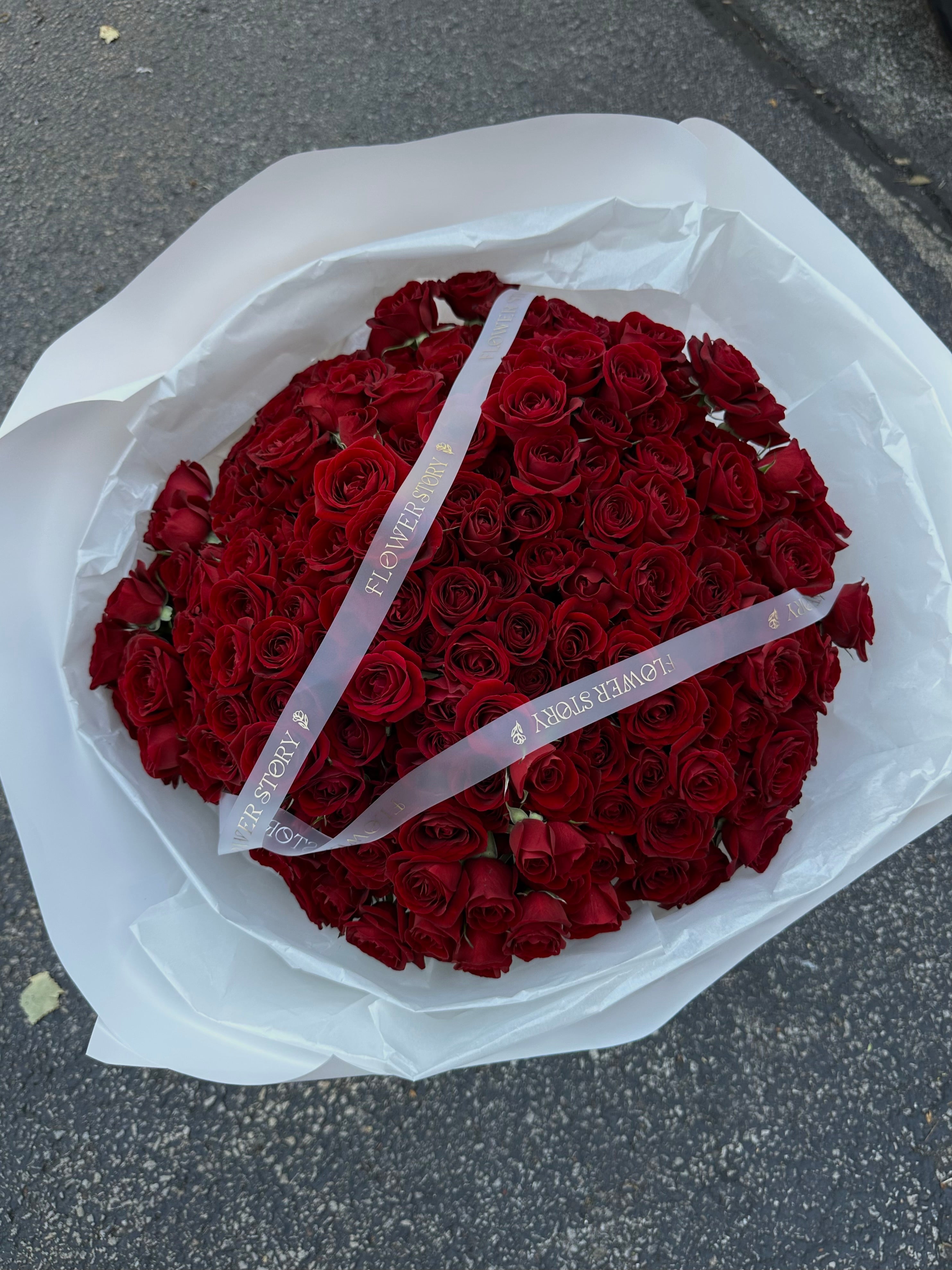 Mono bouquet of red spray roses