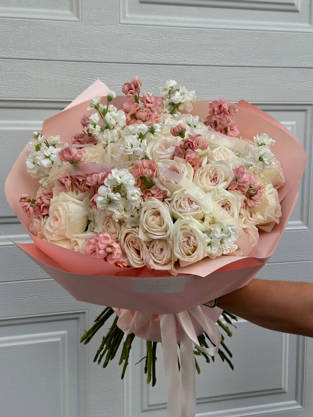 Mixed bouquet of pink stocks, white hydrangeas & roses