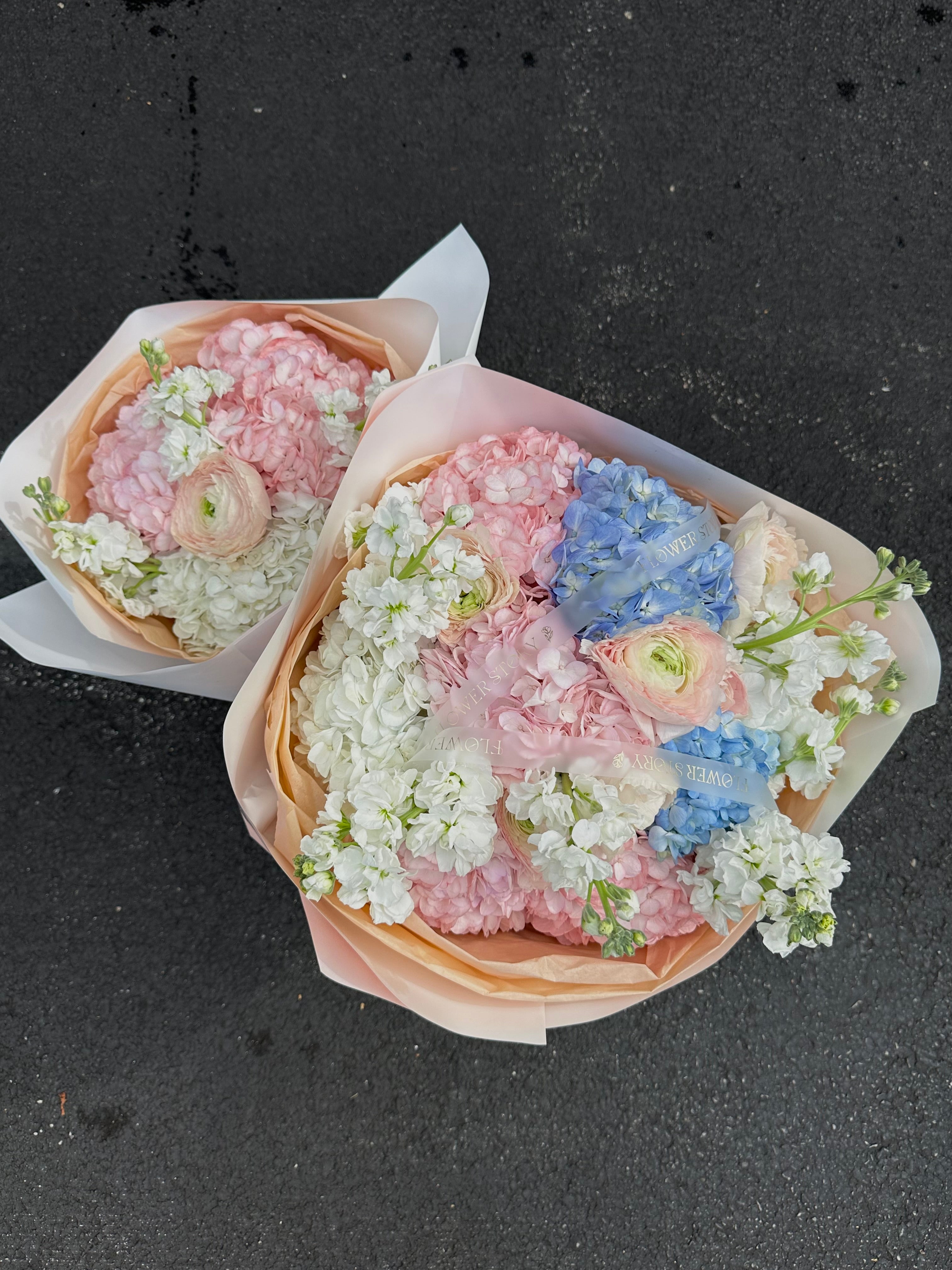 Mix bouquet of hydrangeas, ranunculus & stocks