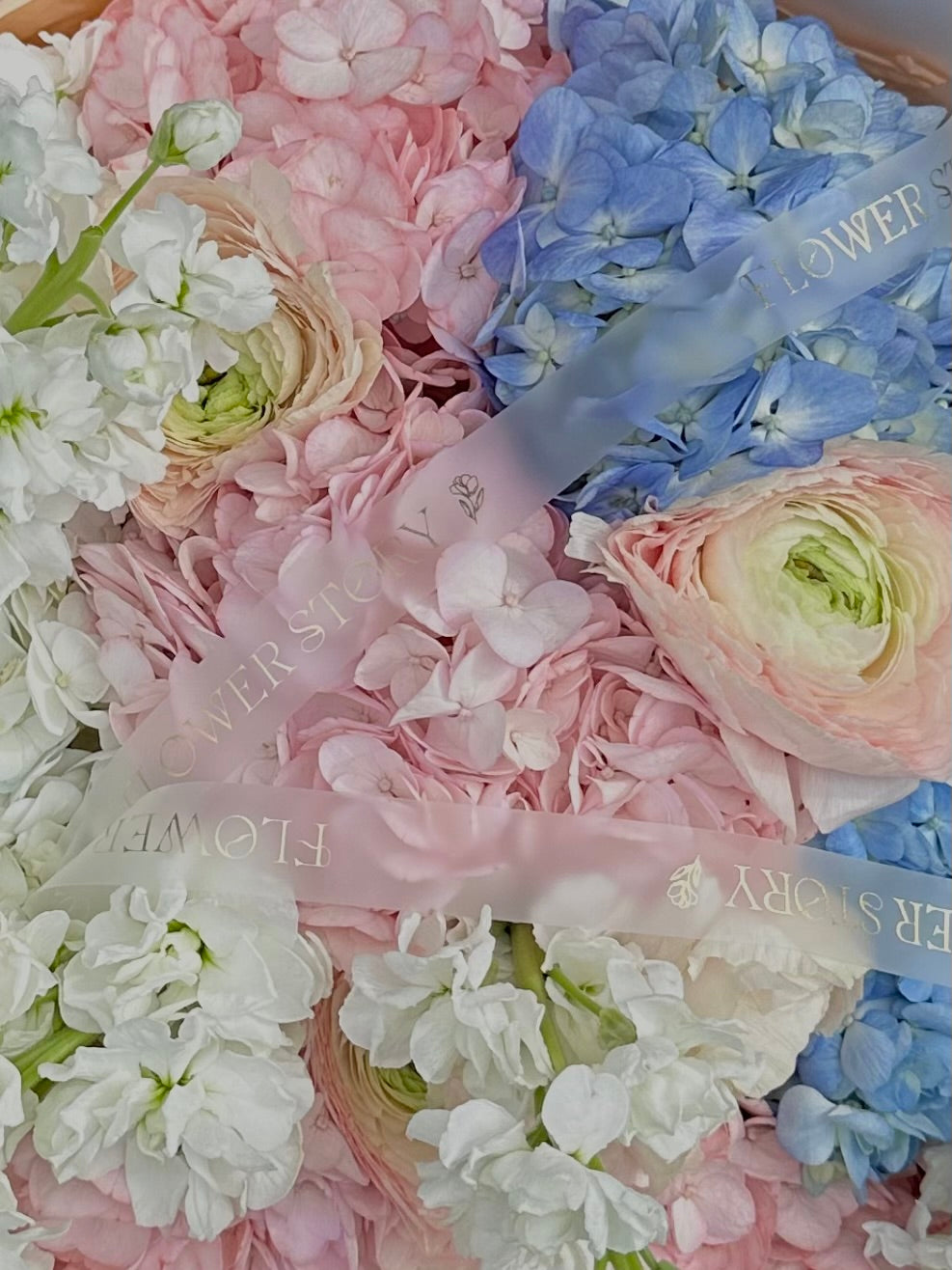 Mix bouquet of hydrangeas, ranunculus & stocks
