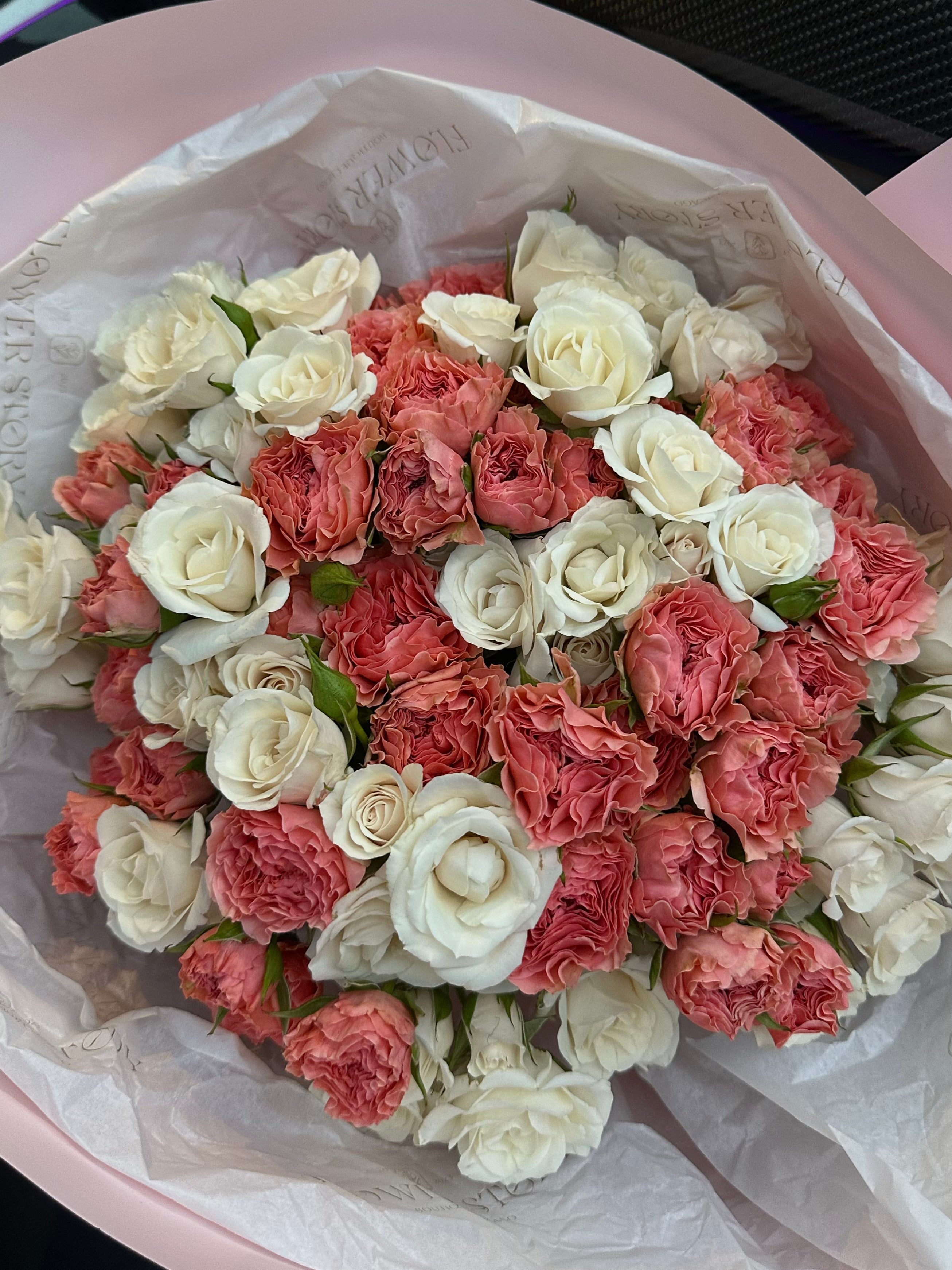 Mono bouquet of coral & white spray roses