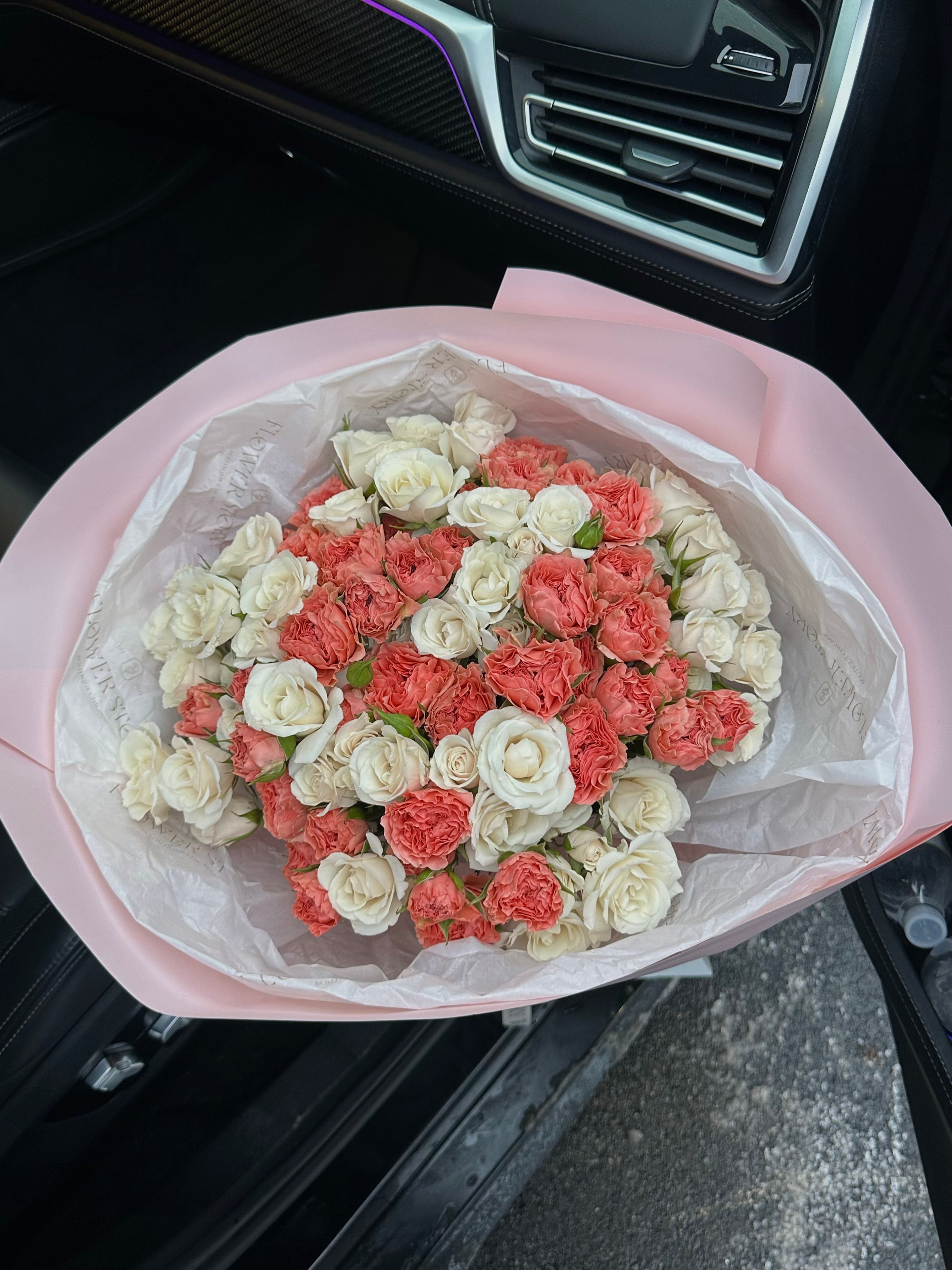 Mono bouquet of coral & white spray roses
