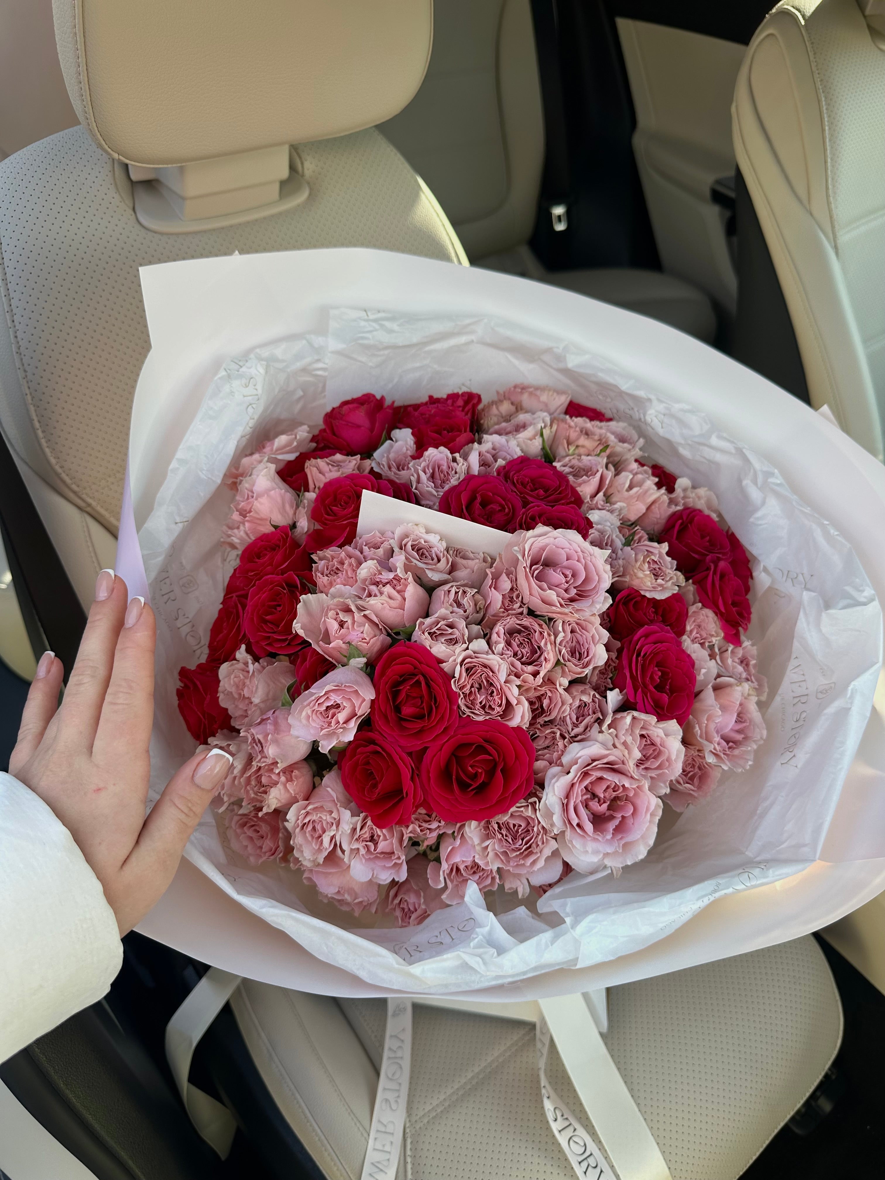 Mono bouquet with pink & hot pink spray roses