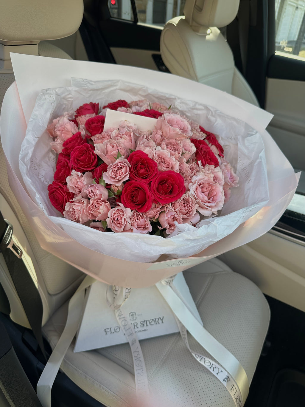 Mono bouquet with pink & hot pink spray roses