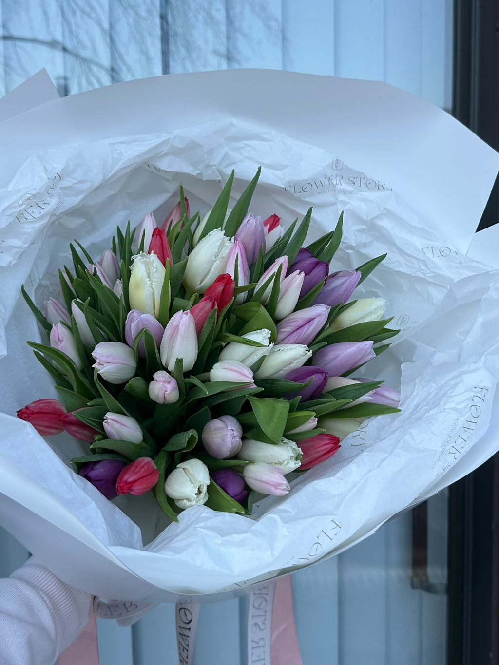 Mono bouquet of colorful tulips