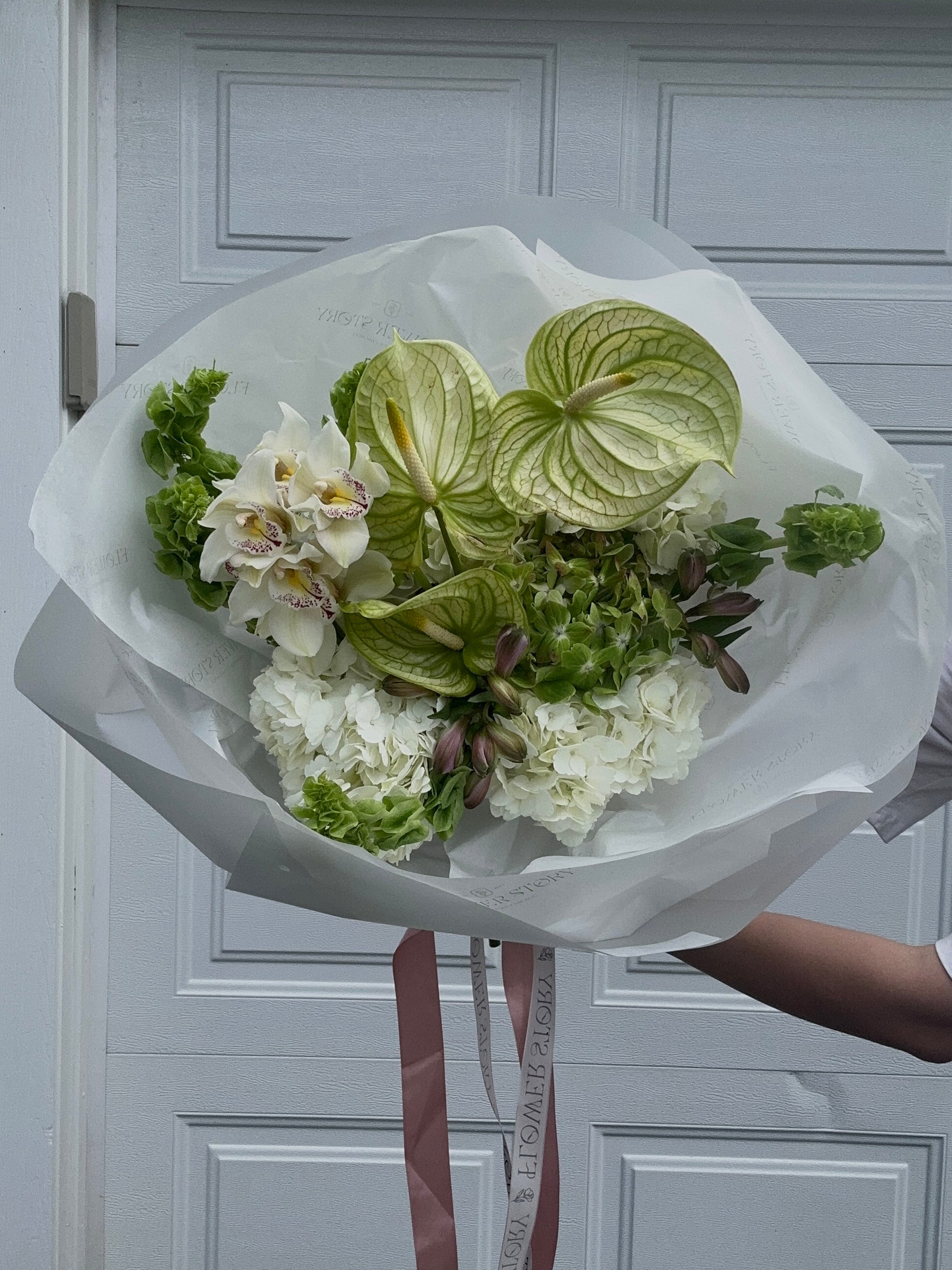 Mix bouquet with anthuriums, hydrangeas & orchids