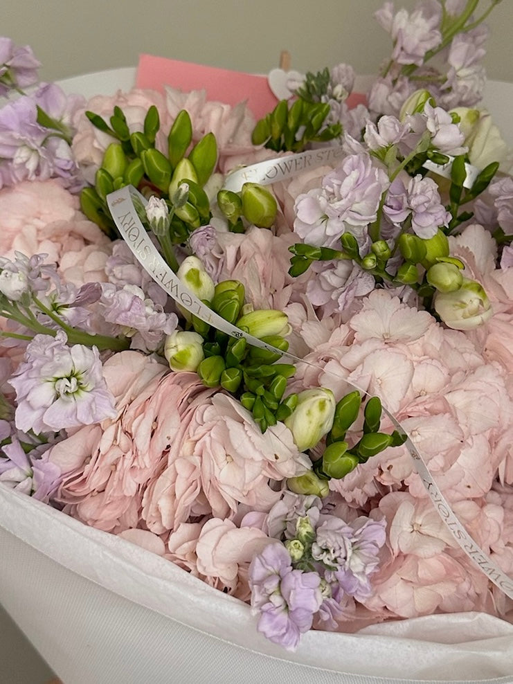 Mix bouquet with pink hydrangeas & purple stocks