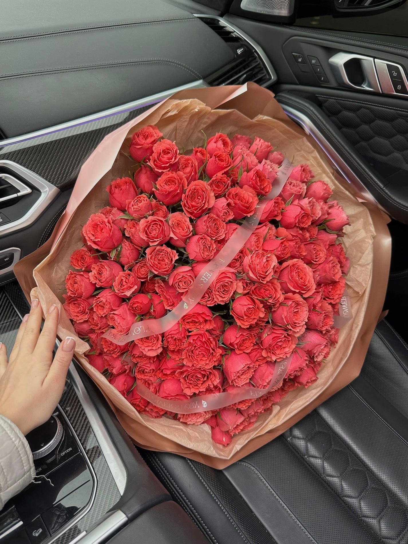 Lush mono bouquet of raspberry spray roses