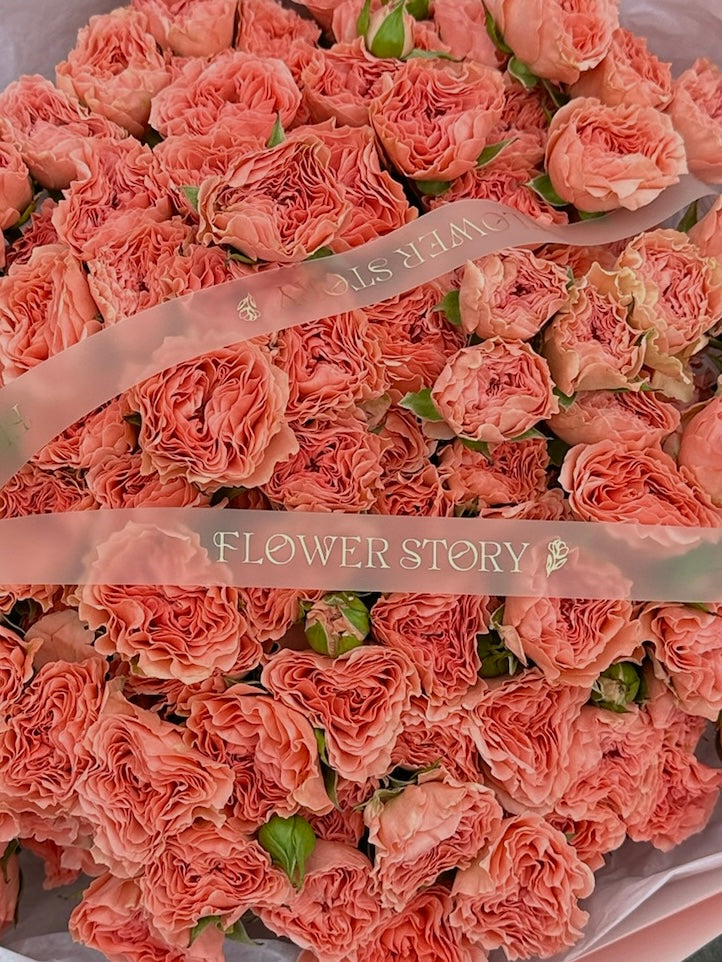 Mono bouquet of coral spray roses