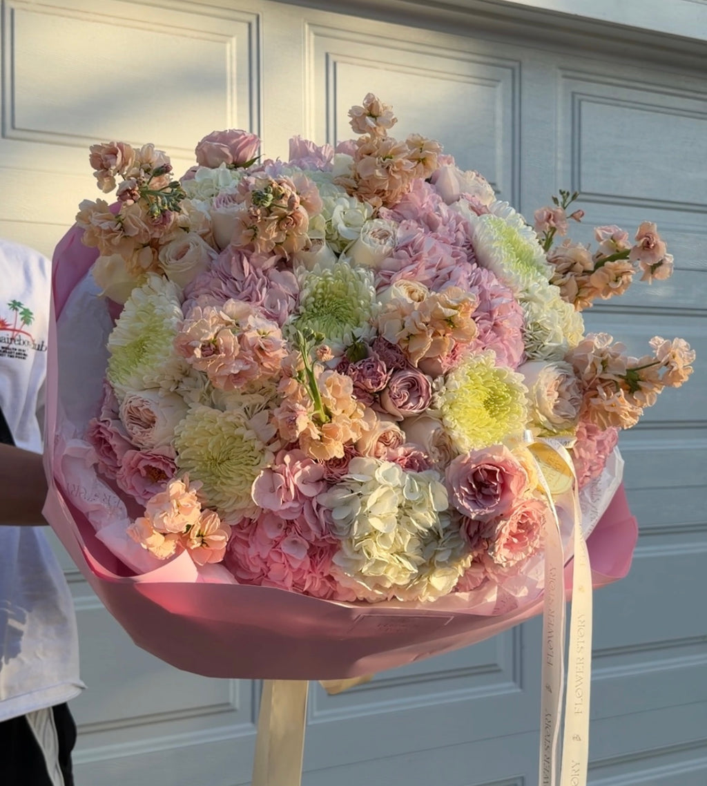 Elegant mixed bouquet with hydrangea, chrysanthemum & stocks